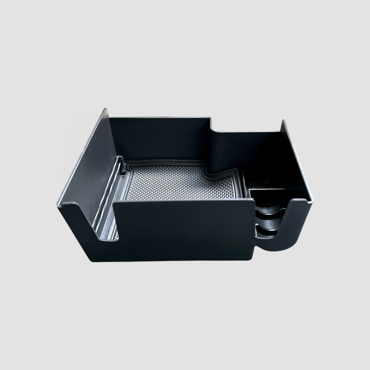 Sort opbevaringsboks til Kia EV9 armlæn, designet til at organisere småting i bilen.