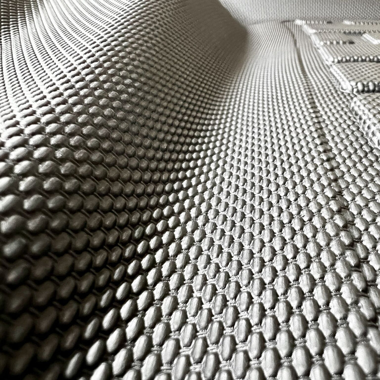 Tekstur af skridsikkert gummi med mønster til bilmåtter, tæt på