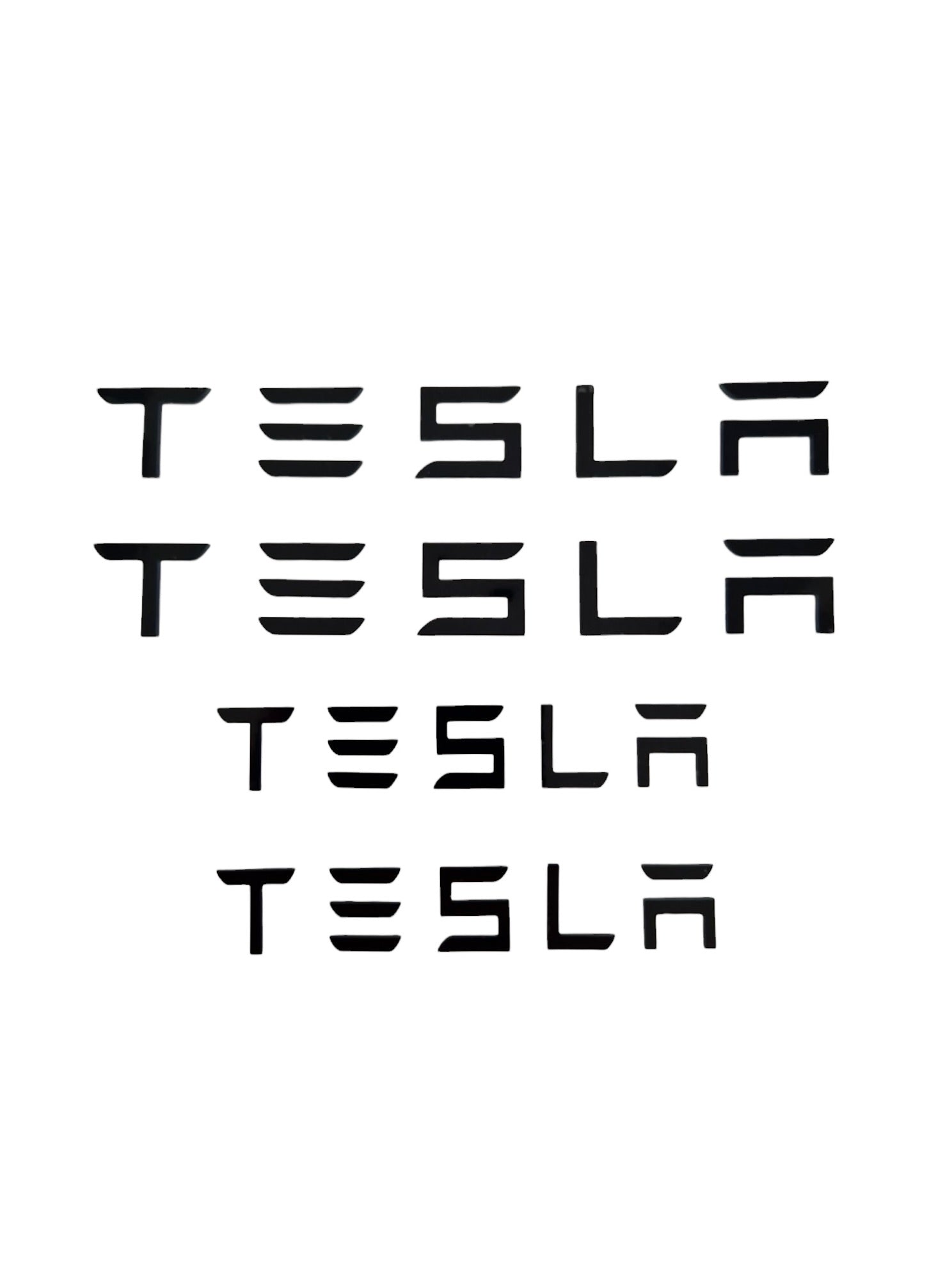 Bogstaver "TESLA"