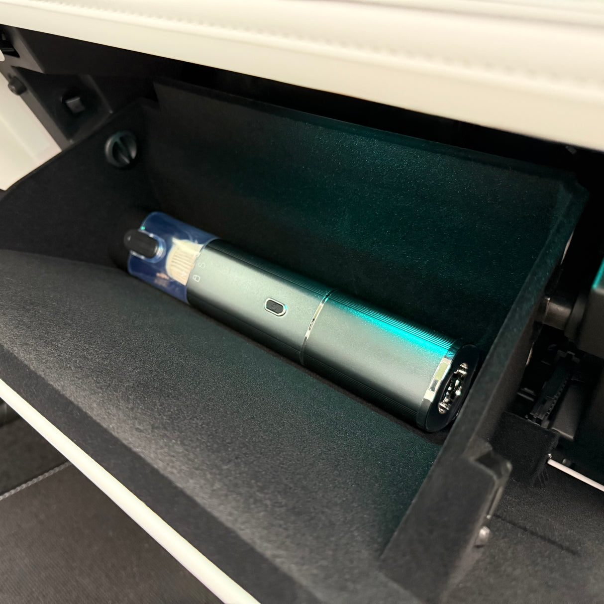 Støvsuger til bil som kan være i et handskerum