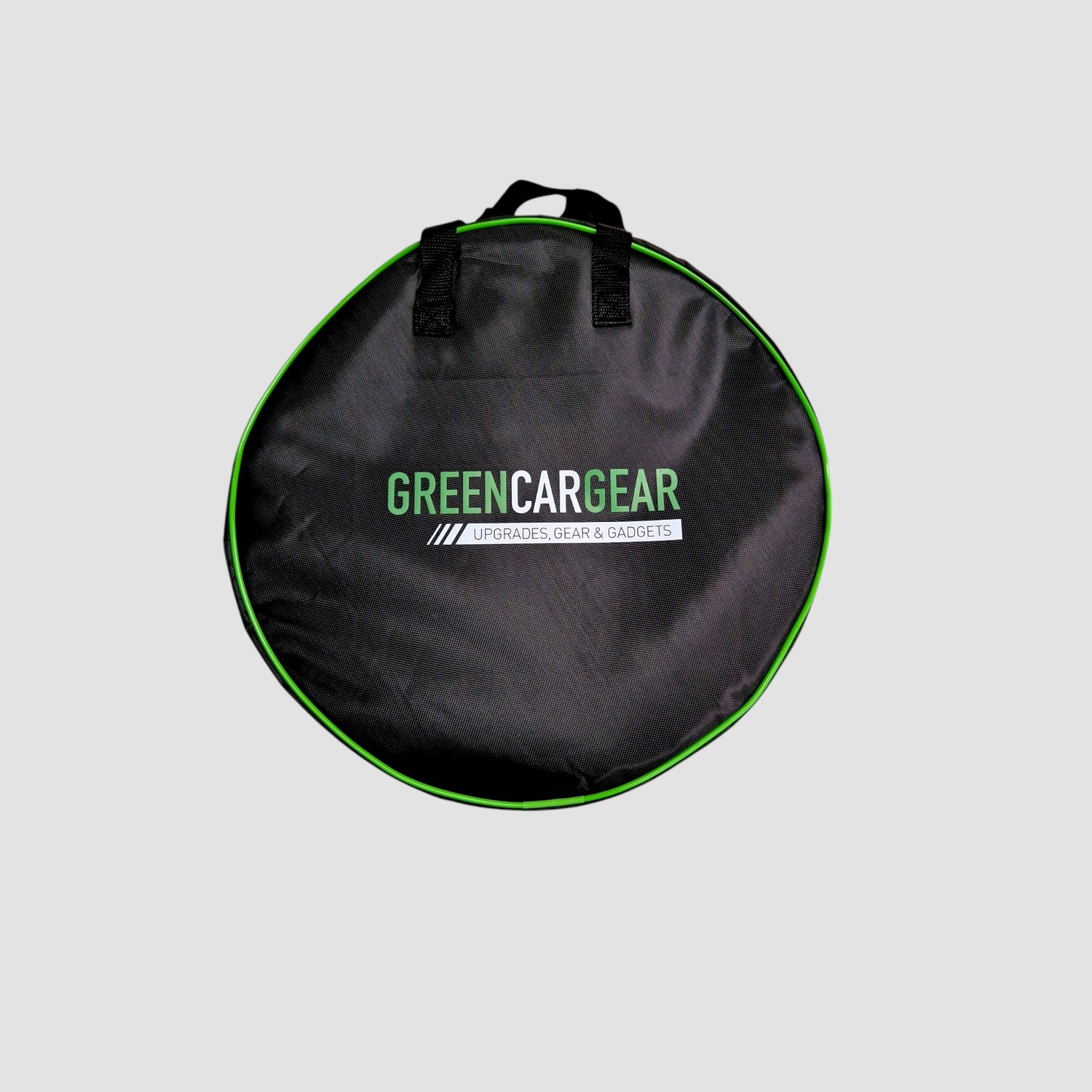 Opbevaringstaske til ladekabel eller mobil lader med GreenCarGear logo.
