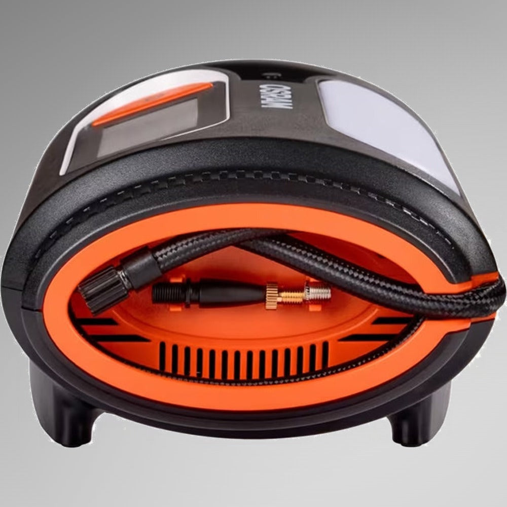 Osram TYREinflate 2120 set fra oven, viser opbevaring af slange og dyser inde i kompressoren