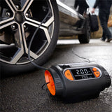 Osram TYREinflate 2130 kompressor på gaden med personer og bil i baggrunden