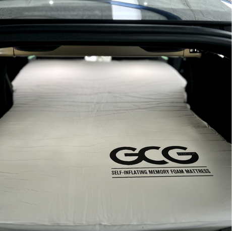 Madras ligger flat i bagagerummet