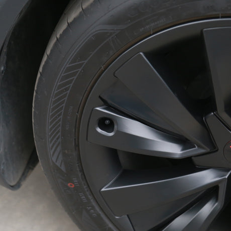 Nærbillede af MV Spiral hjulkapsel, der viser hullet til ventilen