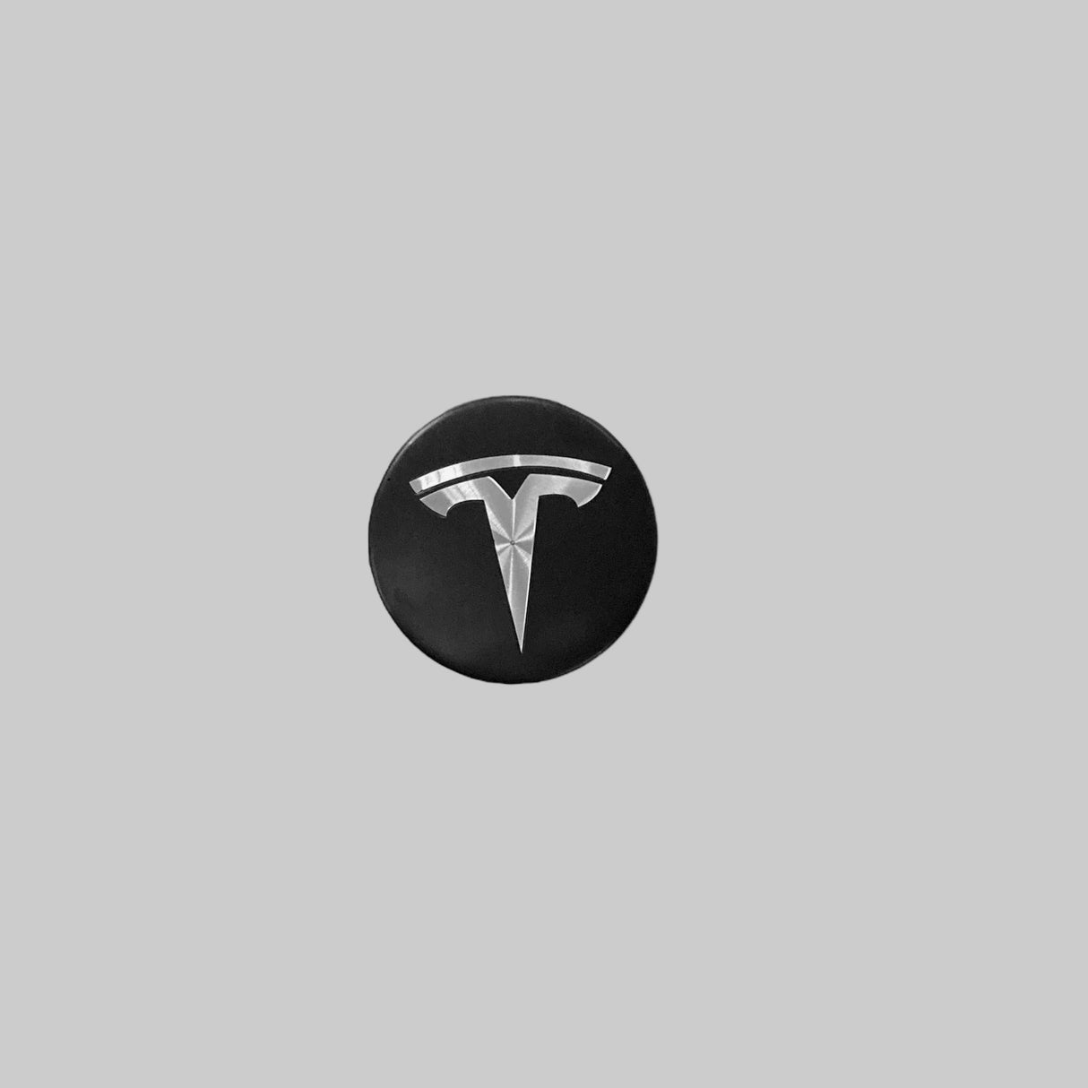 Centerkapsel med sølv Tesla logo