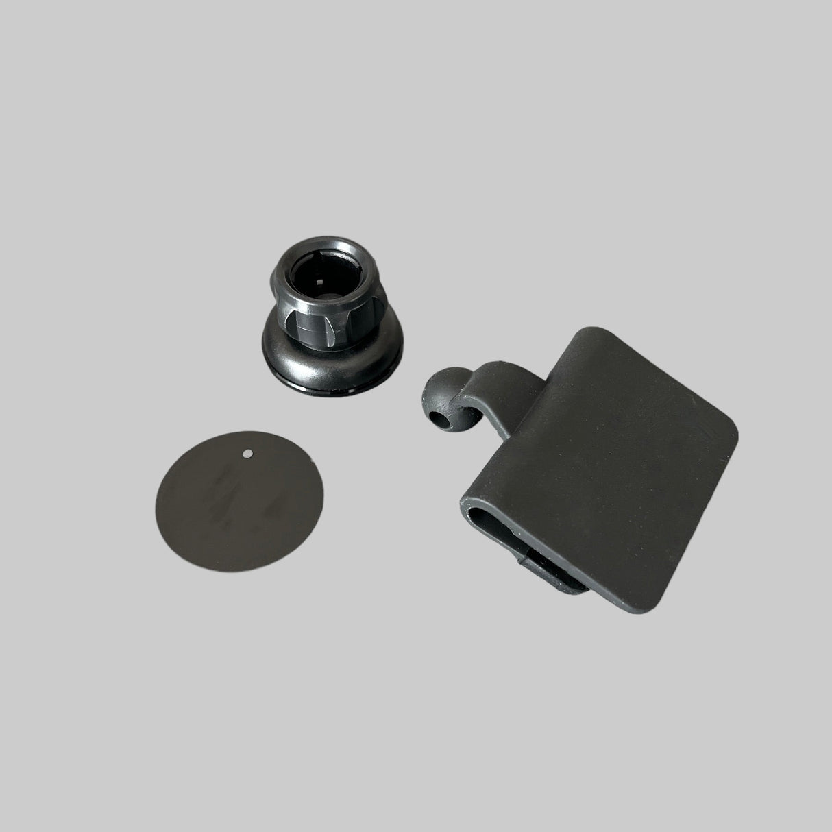 Telefonholderen delt op i flere dele. Viser hvad man får med i pakken. 