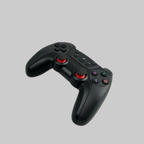 En trådløs controller i farven sort, som kan bruges i Tesla